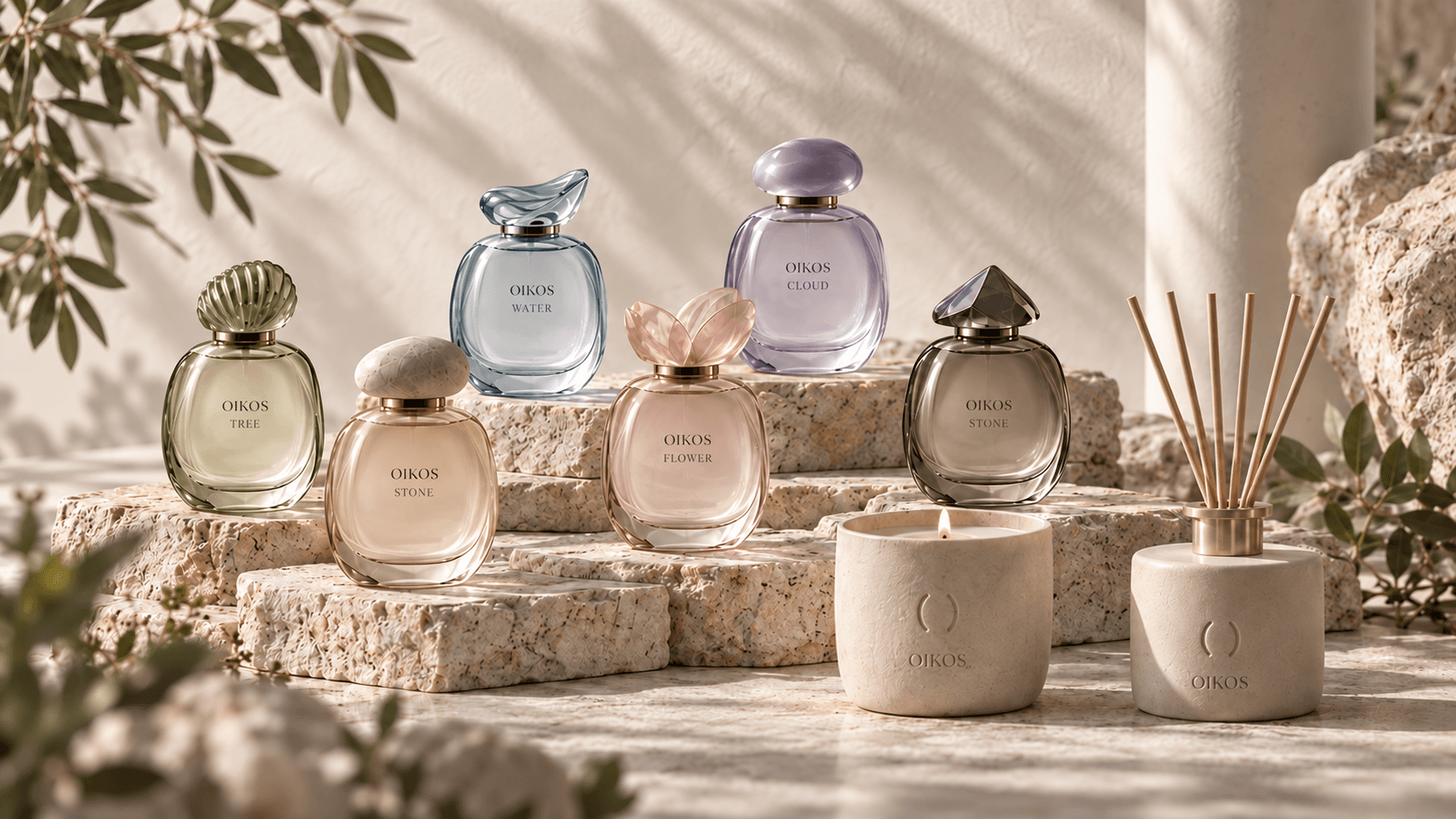 OIKOS fragrance bottle family, candle and reed diffuser concept in a sunlit material setting.