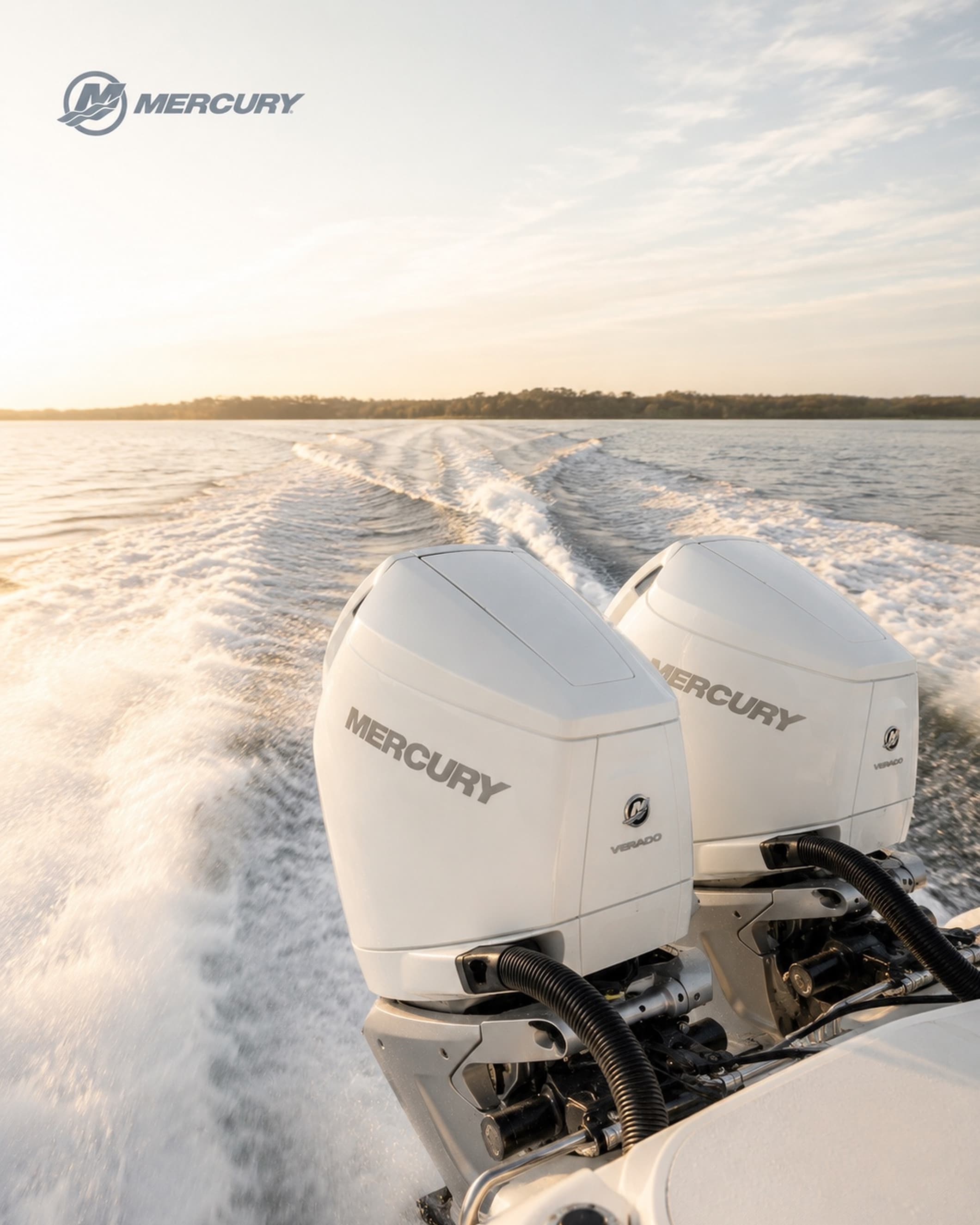 Mercury outboard engines and their wake across open water.